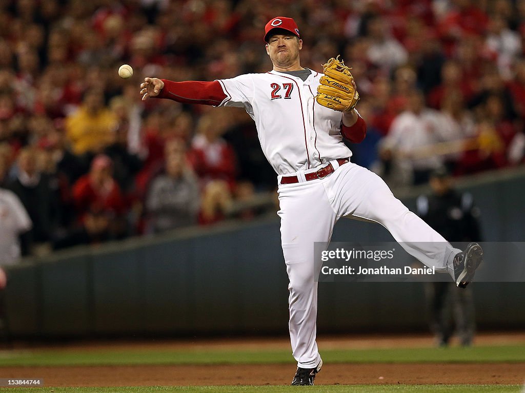 Scott Rolan Cincinnati Reds Scott Rolen of the Cincinnati Reds makes an error at third base on a ...