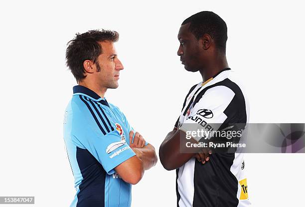 Alessandro Del Piero of Sydney FC and Emile Heskey of Newcastle Jets pose during a 2012/13 A-League player portrait session at Parramatta Stadium on...