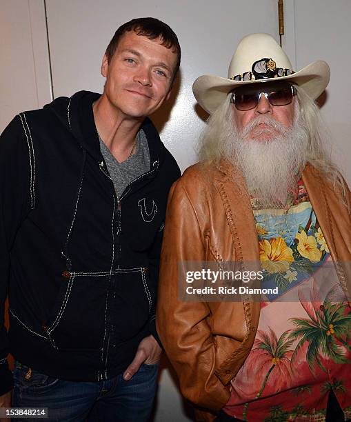 Brad Arnold of 3 Doors Down and Leon Russell pose backstage during the Agency Group Party at at IEBA Conference Day 3 at the War Memorial Auditorium...