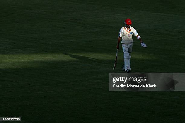 Callum Ferguson of the Redbacks leaves the field after getting out during day two of the Sheffield Shield match between South Australian Redbacks and...