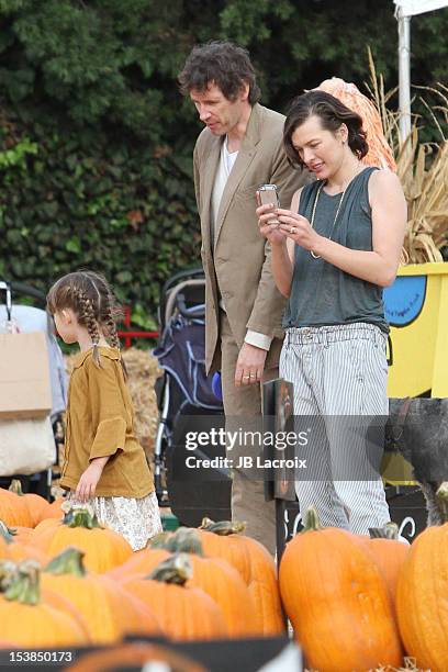 Milla Jovovich, Ever Gabo Anderson and Paul W. S. Anderson are seen at Mr Bones Pumpkin Patch in West Hollywood on October 9, 2012 in Los Angeles,...