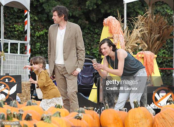 Milla Jovovich, Ever Gabo Anderson and Paul W. S. Anderson are seen at Mr Bones Pumpkin Patch in West Hollywood on October 9, 2012 in Los Angeles,...