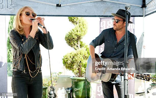 Musicians Emily Haines and James Shaw of the band Metric perform onstage at the 98.7FM Party Penthouse at The Historic Hollywood Tower on October 9,...