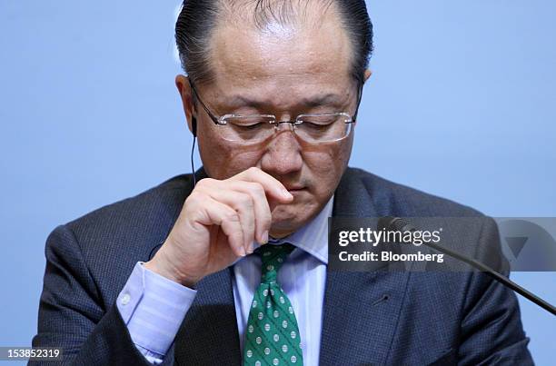 Jim Yong Kim, president of the World Bank Group, pauses during a joint news conference with Koriki Jojima, Japan's finance minister, unseen, at the...