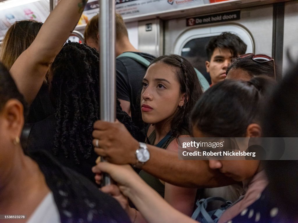 Subway Ridership Riders crowd into a subway car during rush hour July 12, 2023 in New ...