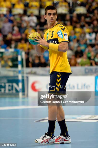 Zarko Sesum of Rhein Neckar Loewen controls the ball during the DKB Handball Bundesliga match between Rhein Neckar Loewen and SG Flensburg Handewitt...