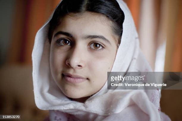 Malala Yousafzai lives in the Swat Valley with her family, pictured on March 26, 2009 in Peshawar, Pakistan. She wants to become a politician and is...
