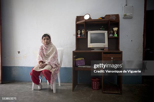 Malala Yousafzai lives in the Swat Valley with her family, pictured on March 26, 2009 in Peshawar, Pakistan. She wants to become a politician and is...