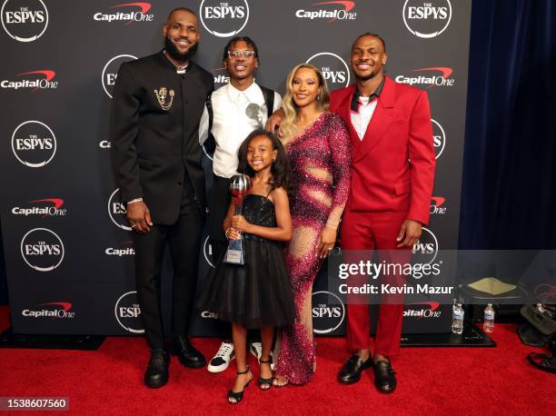 LeBron James, winner of Best Record-Breaking Performance, Bryce James, Zhuri James, Savannah James, and Bronny James attend The 2023 ESPY Awards at...