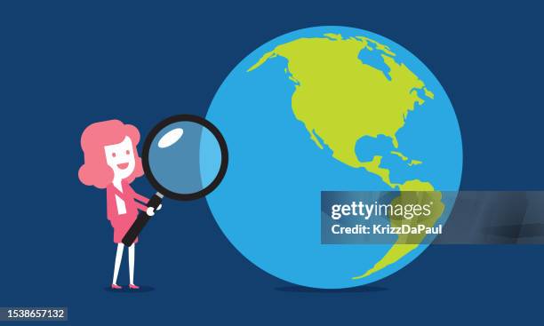 businesswoman holding magnifying glass searching earth - animated spinning globe stock illustrations