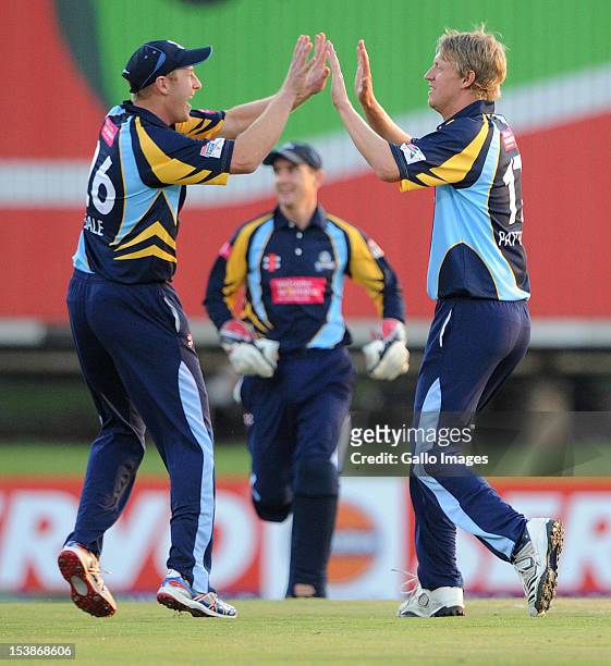Andrew Gale and Steve Patterson of Yorkshire celebrate the wicket of Adrian Barath of Trinidad & Tobago during the Karbonn Smart CLT20 pre-tournament...