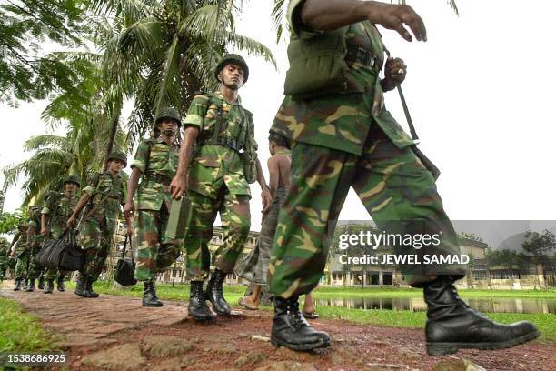 Group of Bangladeshi army troops patrol the district of Munshiganj, some 24 kilometers south of the capital Dhaka, 18 September 2001. Troops were...