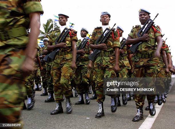 Gobonese army soldiers march 17 August 2001 on the esplanade in Libreville during a military parade celebrating the 41st anniversary of Gabon's...