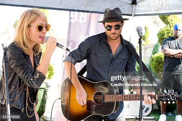 Musicians Emily Haines and James Shaw of the band Metric perform onstage at the 98.7FM Party Penthouse at The Historic Hollywood Tower on October 9,...