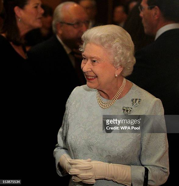 Queen Elizabeth II attends a reception for the participants of the Royal Windsor Horse Show Jubilee Pageant which was held in May, at Windsor Castle...