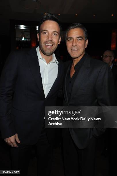 Actors Ben Affleck and George Clooney attend the "Argo" screening at the Time Warner Screening Room.