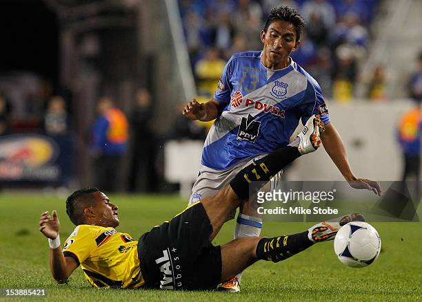 Alejandro Torres of Barcelona SC and Oscar Bagui of CS Emelec vie for the ball during a International Friendly at Red Bull Arena on October 10, 2012...