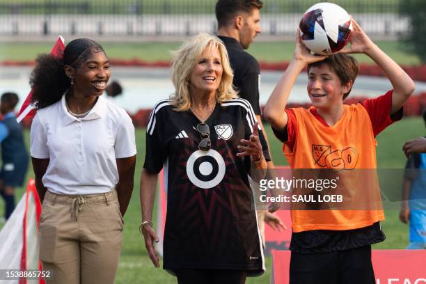 First Lady Jill Biden watches as local children participate in a youth soccer clinic with Major League Soccer players and coaches ahead of the MLS...