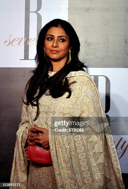 Indian Bollywood actress Tabu poses as she arrives to attend the 70th Birthday celebration of Bollywood actor Amitabh Bachchan in Mumbai on October...