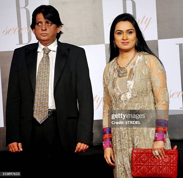 Indian Bollywood actress Padmini Kolhapure poses with her husband Pradeep Sharma as they attend the 70th Birthday celebrations of Bollywood Actor...