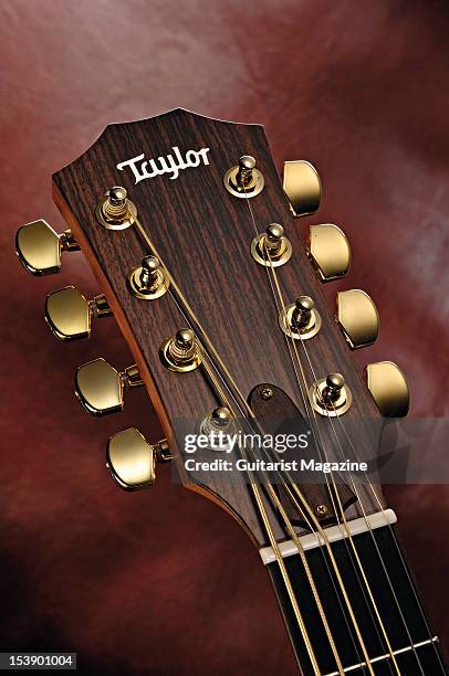 The headstock of a Taylor GT-8 8-string baritone acoustic guitar, during a studio shoot for Guitarist Magazine/Future via Getty Images, March 15,...