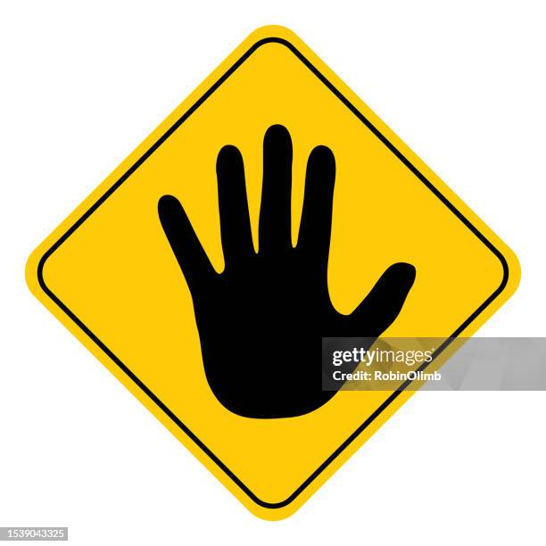 black human hand road sign - stop gesture stock illustrations