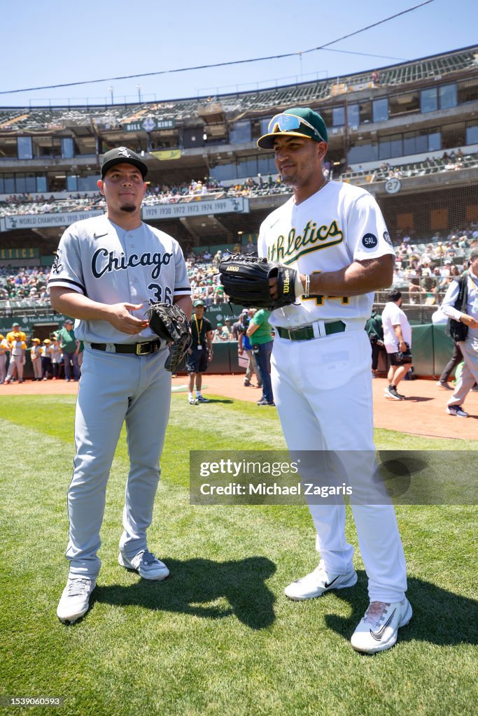 Brothers Carlos Perez of the Oakland Athletics and Carlos Perez of News  Photo - Getty Images