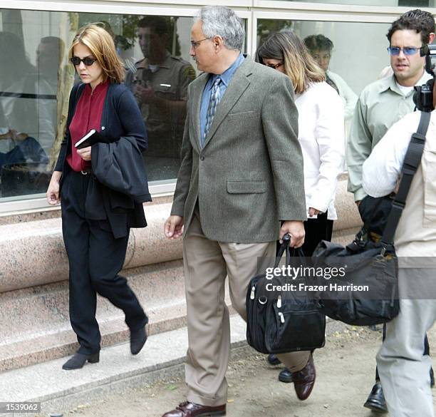 Actor Robert Blake's daughter, Delinah Blake , arrives for her father's hearing at the Van Nuys Superior Court with Scott Ross , a private...