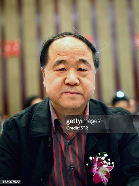 This picture taken on March 25 shows Chinese writer Mo Yan, the 2012 Nobel Literature Prize winner, attending a novel competition in Haikou, in south...