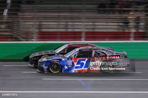 Jeremy Clements and Joe Graf Jr. Race side by side during the NASCAR Xfinity Series Alsco Uniforms 250 on July 8, 2023 at Atlanta Motor Speedway in...