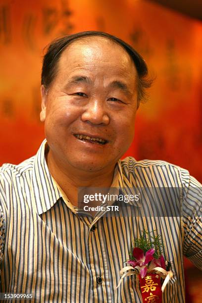 This picture taken on July 19, 2010 shows Chinese writer Mo Yan, the 2012 Nobel Literature Prize winner, attending a premier of a TV series in...