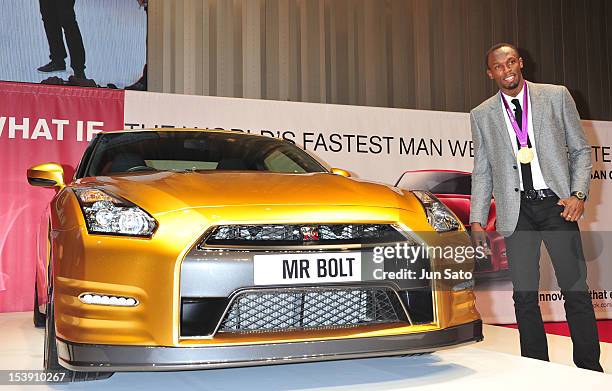 Usain Bolt attends the Nissan GT-R promotional event at Nissan Global Headquarters on October 11, 2012 in Yokohama, Japan.