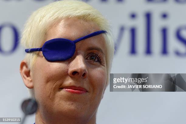 Former formula one Marussia test driver Spanish Maria de Villota gives a press conference in Madrid on October 11, 2012. De Villota lost her right...