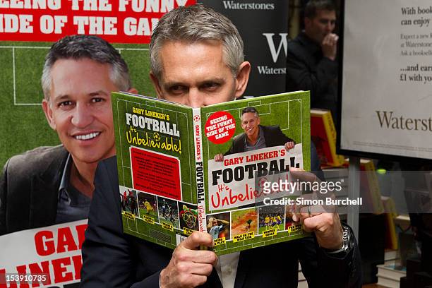 Gary Lineker meets fans and signs copies of his book 'Gary Lineker's Football: It's Unbelievable!' at Waterstone's Leadenhall Market on October 11,...