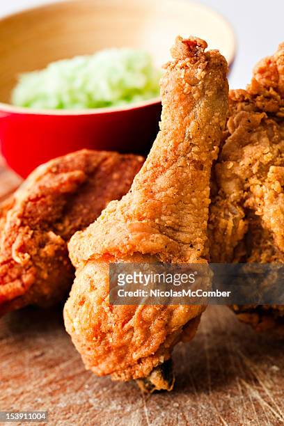 fried chicken leg - southern food stock pictures, royalty-free photos & images