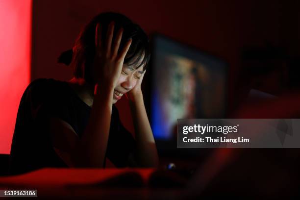 Student Crying At Computer Confused Student At Computer Photos and Premium High Res Pictures ...