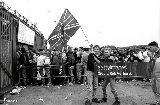 18th MAY: Audience members and fans of The Rolling Stones queue before the band perform live on stage at the Stadion Feijenoord in Rotterdam,...