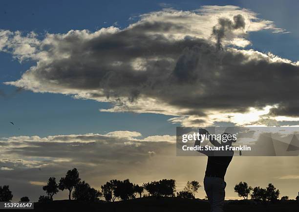 Lee Slattery of England plays a shot during the first round of the Portugal Masters at the Victoria golf course at Villamoura on October 11, 2012 in...