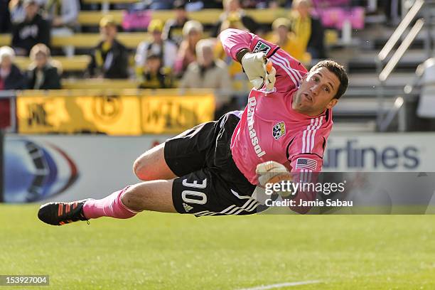 Goalkeeper Andy Gruenebaum of the Columbus Crew makes a save against Sporting Kansas City on October 7, 2012 at Crew Stadium in Columbus, Ohio.