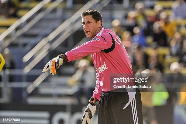 Goalkeeper Andy Gruenebaum of the Columbus Crew directs his teammates during a game against Sporting Kansas City on October 7, 2012 at Crew Stadium...