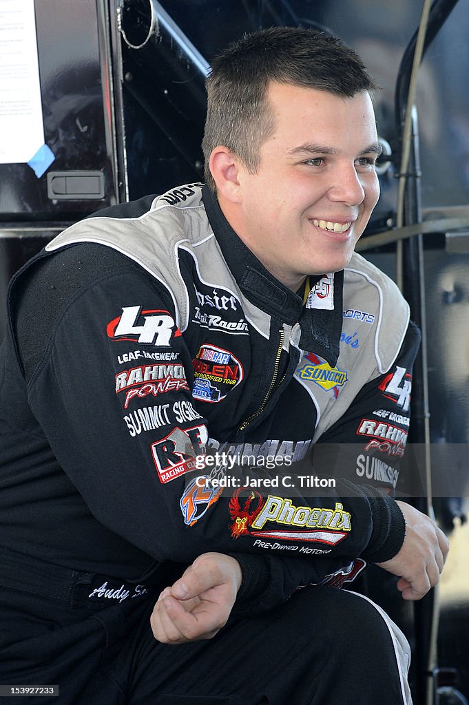 Rahmoc Racing Andy Seuss, driver of the RAHMOC Racing Engines Chevrolet, stands in ...
