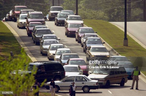 Fans arrive for the public funeral of singer Lisa "Left Eye" Lopes at the New Birth Missionary Baptist Church May 2, 2002 in Lithonia, GA. Lopes was...