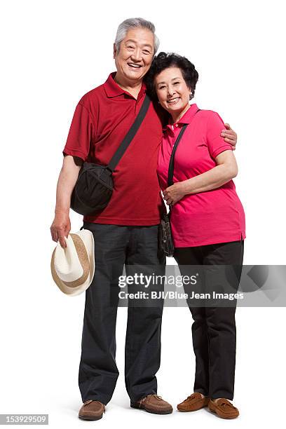 portrait of senior couple travelling - older couple travelling photos et images de collection