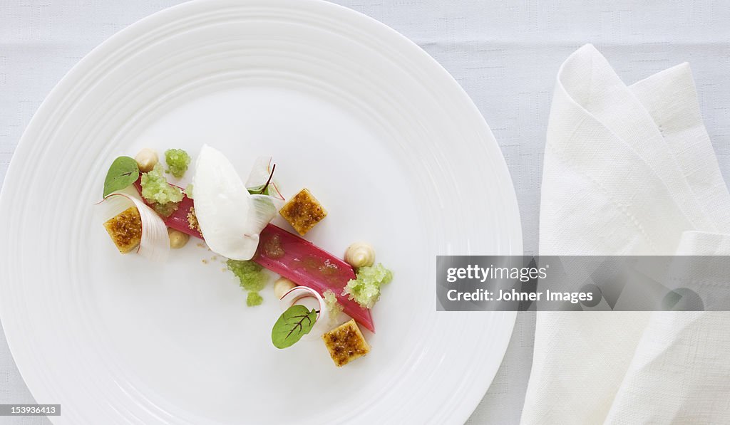 Elegant place setting with dessert