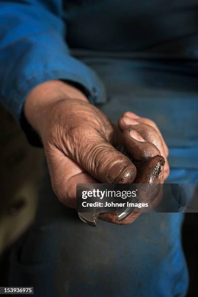 human hand holding wrench - adjustable wrench stockfoto's en -beelden