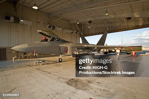 Maintence personnel from the 49th Fighter Wing at Holloman Air Force Base, New Mexico, prepare to refuel an F-22 Raptor. Maintence personnel from the 49th Fighter Wing at Holloman Air Force Base, New Mexico, prepare to refuel an F-22 Raptor.