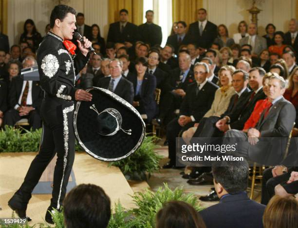 Mexican singer Pedro Fernandez performs for U.S. President George W. Bush and an audience May 3, 2002 in the East Room of the White House in...