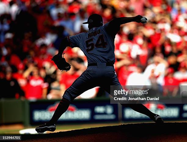 Sergio Romo of the San Francisco Giants pitches in the 9th inning against the Cincinnati Reds in Game Five of the National League Division Series at...