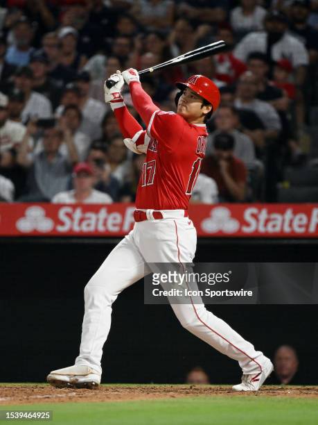 Los Angeles Angels designated hitter Shohei Ohtani hits a two run home run during the seventh inning of an MLB baseball game against the New York...