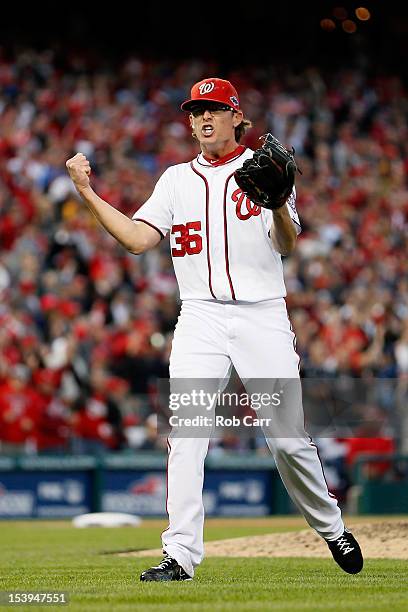 Tyler Clippard of the Washington Nationals reacts after he struck out the side to end the top of the eighth inning against the St. Louis Cardinals...